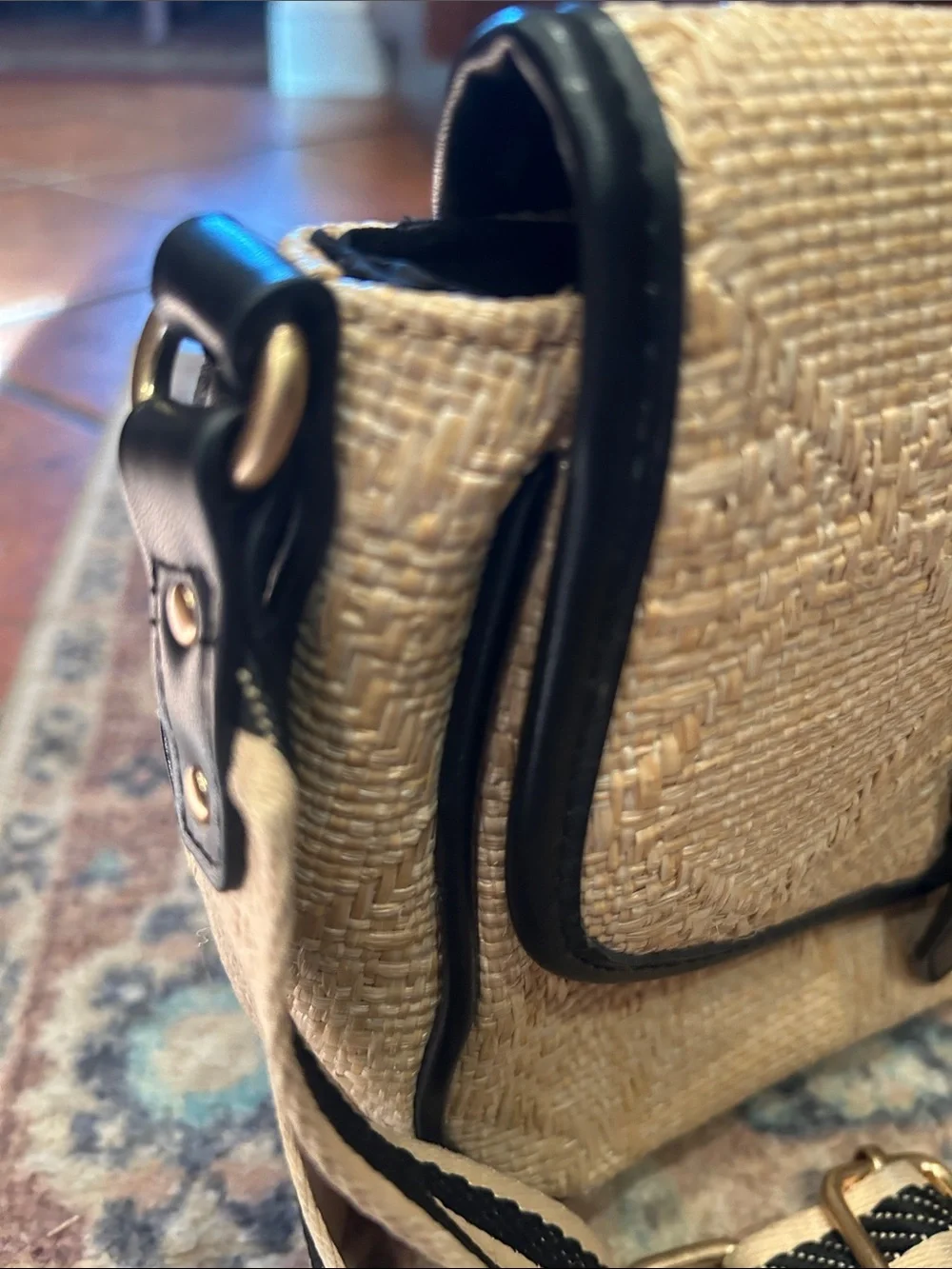 Neutral Woven Crossbody Bag with Black Trim and Striped Strap